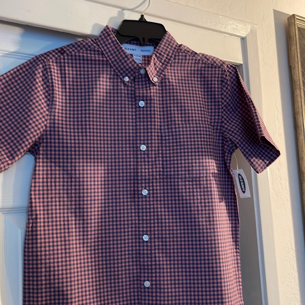 Selling my son’s new shirt.